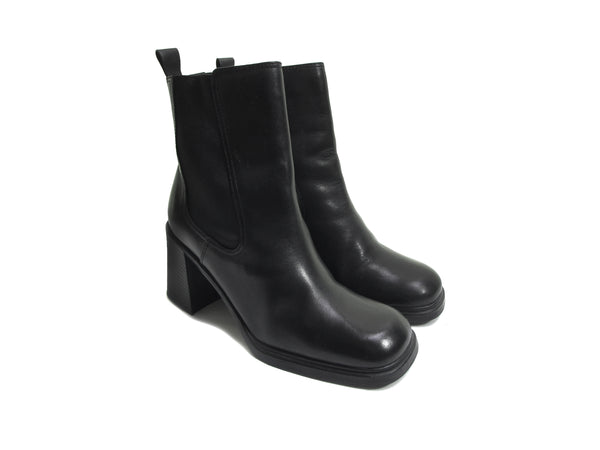 Women's Vintage 90s Black Chunky Heel Leather Boots - Square Toe Chelsea Beatle Biker Moto Ankle Boot - Perfect for Everyday Wear or a Night Out! Boots facing on an angle.